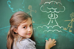 thumbnail of Cute little girl drawing on blackboard.jpg