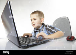 thumbnail of little-kid-boy-playing-on-the-computer-laptop-technology-DEJFEC.jpg