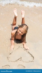 thumbnail of little-girl-beach-enjoying-43085246.jpg