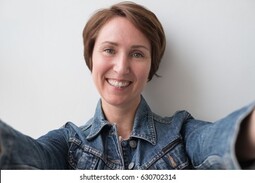 thumbnail of portrait-middleaged-woman-denim-jacket-260nw-630702314[1].jpg
