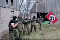 thumbnail of watkins-telegram-video-bad-axe-farm-nazi-shooting.png