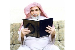 thumbnail of quran & old man.jpg