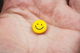 thumbnail of close-up-view-hand-holding-yellow-pill-smiley-face-close-up-view-hand-holding-yellow-pill-smiley-144391591.jpg