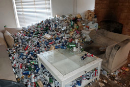 thumbnail of Hoarder-from-hell-buries-apartment-in-beer-cans-feces.jpg