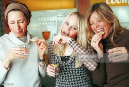 thumbnail of three-women-with-tequila-shots-one-licking-salt-from-hand-picture-id200020814-001[1]