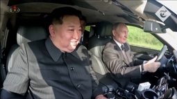 thumbnail of Putin and Kim laugh and chat in front seat footage from limo drive in Pyongyang.mp4