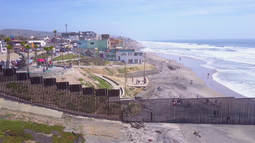 thumbnail of videoblocks-a-dramatic-aerial-reveals-the-us-mexico-border-fence-in-the-pacific-ocean-between-san-diego-and-tijuana_baoj2z4hz_thumbnail-full01.png