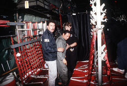 thumbnail of Manuel_Noriega_with_agents_from_the_U.S._DEA.jpg