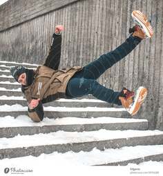 thumbnail of 3954288-man-slip-on-ice-and-falling-down-stairs-photocase-stock-photo-large.jpeg