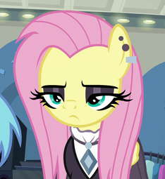 thumbnail of 1712420__safe_screencap_fluttershy_fake+it+'til+you+make+it_spoiler-colon-s08e04_clothes_cropped_ear+piercing_earring_eyeshadow_female_fluttergoth_fl.png