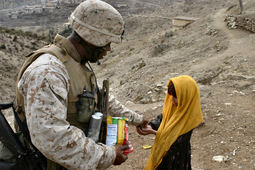 thumbnail of Marine_gives_Afghan_girl_candy.jpg