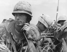 thumbnail of a-platoon-commander-from-the-united-states-1st-marine-division-using-a-radio-during-operations-1979942938.jpg