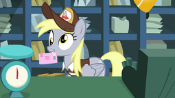 thumbnail of 2083604__safe_screencap_derpy+hooves_between+dark+and+dawn_spoiler-colon-s09e13_letter_letter-dash-balance_mailmare_mouth+hold_pony_post+office_solo.png