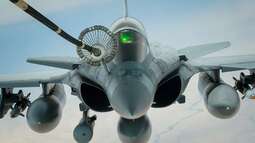 thumbnail of a-french-air-force-dassault-rafale-refuels-from-a-us-c23d76-1024.jpg