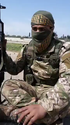 thumbnail of Members of jihadist group Ansar al-Islam sit on the M4 highway in northwest Syria and sing a nasheed in a bid to block joint Turkish-Russian patrols.mp4