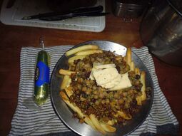 thumbnail of chick peas  chippos sunflower seeds pepitas TVP on top of green beans and a nazipan chocolate bar.jpg