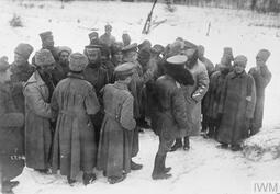 thumbnail of German_and_Bolshevik_troops_fraternizing_in_the_area_of_the_Yaselda_River_(February_1918).jpg