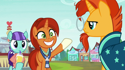 thumbnail of 2333662__safe_stellar+flare_sunburst_earth+pony_pony_unicorn_background+pony_clothes_cup_female_glasses_grin_jewelry_male_mare_mixed+berry_mother+and+son_neckla.png