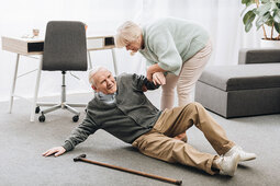 thumbnail of old-woman-helping-to-stand-up-husband-who-falled-down-on-floor.jpg