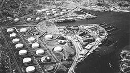 thumbnail of Aerial_view_of_the_Pearl_Harbor_submarine_base_and_adjacent_fuel_tank_farms_on_13_October_1941_(80-G-182880)_(cropped).jpg