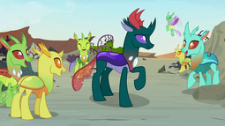 thumbnail of 2664802__safe_pharynx_thorax_changedling_changeling_background+changeling_clypeus_cornicle_flying_king+thorax_male_prince+pharynx_raised+hoof_screencap_spread+w.png