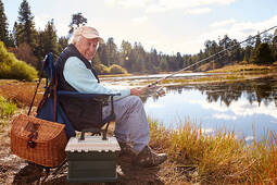 thumbnail of senior-man-fishing-in-a-lake-looking-to-camera-california-picture-id518186304-1408352895.jpg