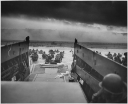 thumbnail of WWII,_Europe,_France,_'Into_the_Jaws_of_Death_-_U.S._Troops_wading_through_water_and_Nazi_gunfire'_-_NARA_-_195515.jpg